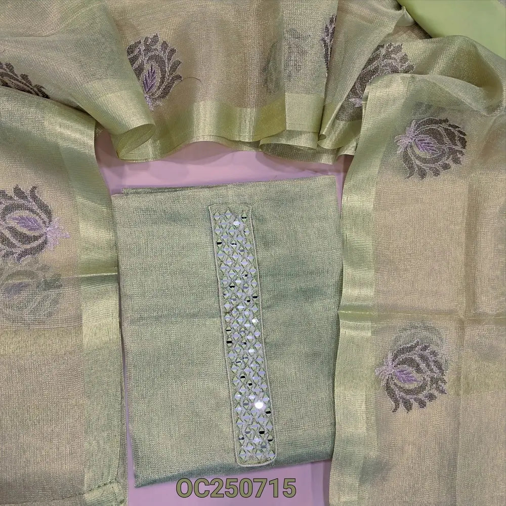 Light green with gold tint premium tissue silk cotton unstitched salwar material, real mirror work on yoke(Shiny, lining needed) matching silky bottom, embroidery work on tissu silk cotton dupatta with tassels. OC250715