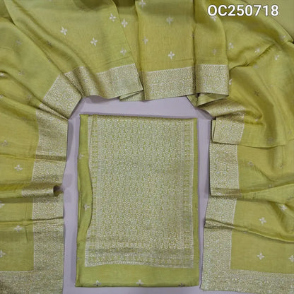 Greenish yellow fancy dola silk unstitched salwar material, zari weaving on yoke and front (Silky, lining needed) matching silky bottom, fancy dola silk zari woven dupatta. OC250719