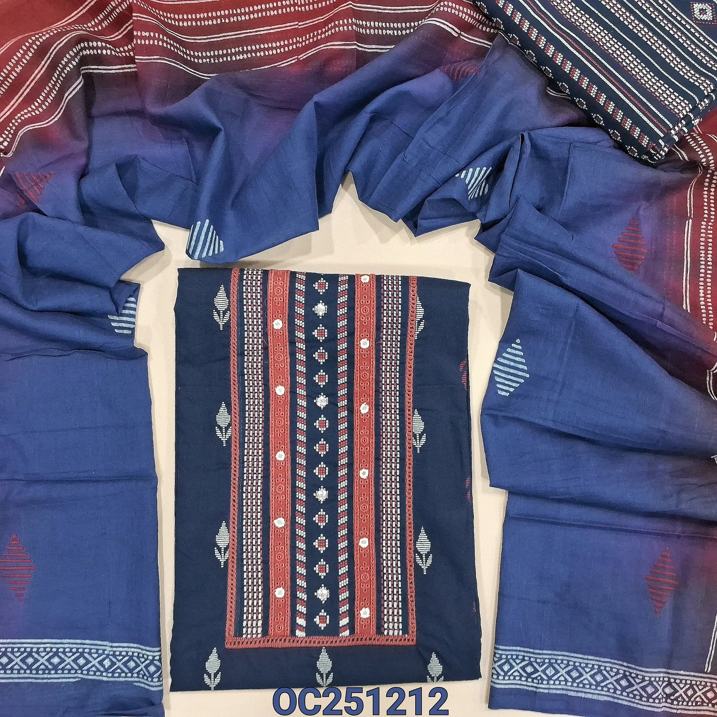 Blue premium pure soft cotton unstitched salwar material, printed all over(lining needed) fancy lace tapings on yoke, printed matching cotton bottom, block printed dual shaded mul cotton dupatta. OC251212