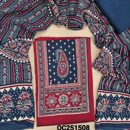Red rayon unstitched salwar material, printed patch and faux mirror work on yoke,(shiny, lining optional), blue spun cotton bottom, printed rayon full length dupatta. OC251508