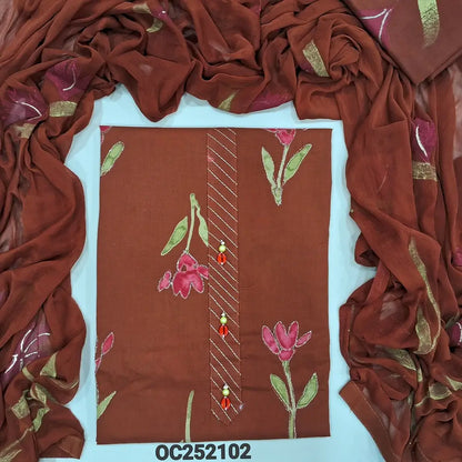 Light brownish maroon pure cotton unstitched salwar material (lining optional) floral printed allover, zari lines & fancy buttons on yoke, matching cotton bottom, brush paint work on chiffon dupatta. OC252102