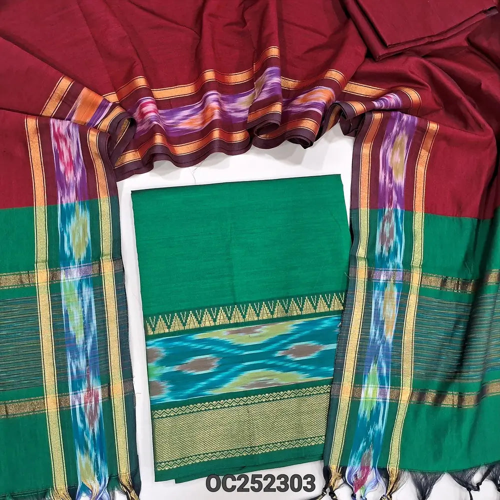 Bottle Green silk cotton unstitched salwar material, thread woven design on daman(lining needed) reddish maroon silk cotton bottom, dual shaded silk cotton dupatta with ikat woven borders & tassels. OC252303