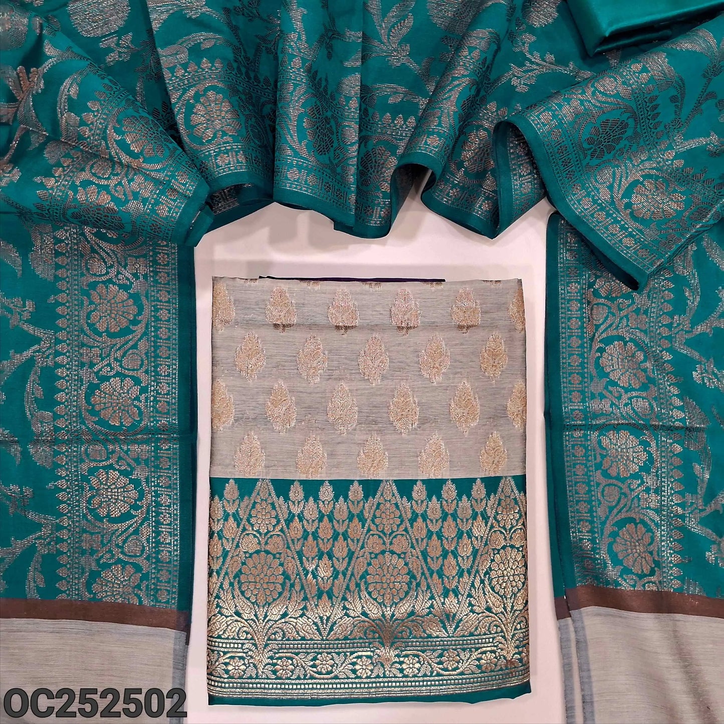 Dark Beige with teal Green benarasi silk cotton unstitched salwar material, rich antique zari weaving all over (Lining Needed) teal green silk cotton Bottom, Benarasi Zari Woven Dual Shaded Dupatta. OC252502