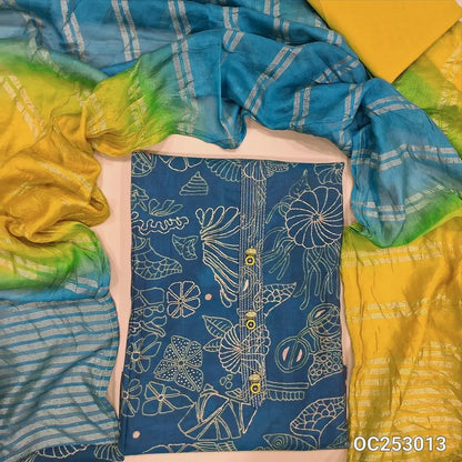 Printed teal Blue silk cotton unstitched salwar material (Lining optional) zari lines & fancy buttons on yoke, mehandhi yellow cotton bottom, dual shade silk cotton dupatta with zari lines. OC253013