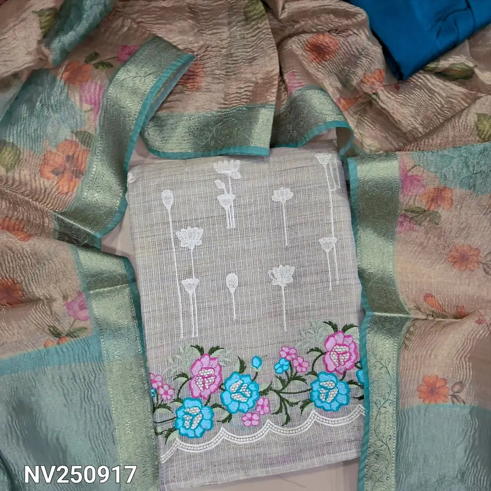 Rich beige with golden tint tissue kota silk cotton unstitched salwar material, embroidered on daman(thin fabric, lining needed) turquoise green silk cotton bottom, digital printed crinkled tissue silk cotton dupatta with zari borders. NV250917