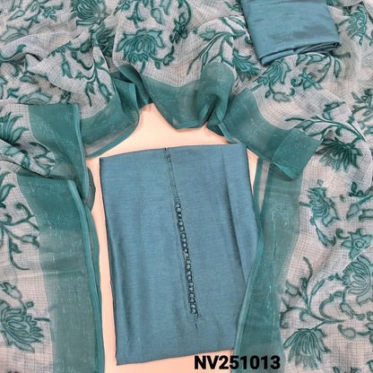 Pastel blue fancy silk unstitched salwar material (lining needed) potli buttons on yoke, real mirror work on front, matching silky bottom, floral printed kota silk dupatta. NV251013