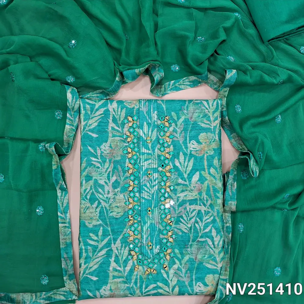 Light turquoise green fancy jute silk unstitched salwar material(textured, lining needed)real mirror work on yoke,leafy and floral printed all over, silk cotton bottom, thread and sequins work on fancy chiffon dupatta with tapings. NV251410