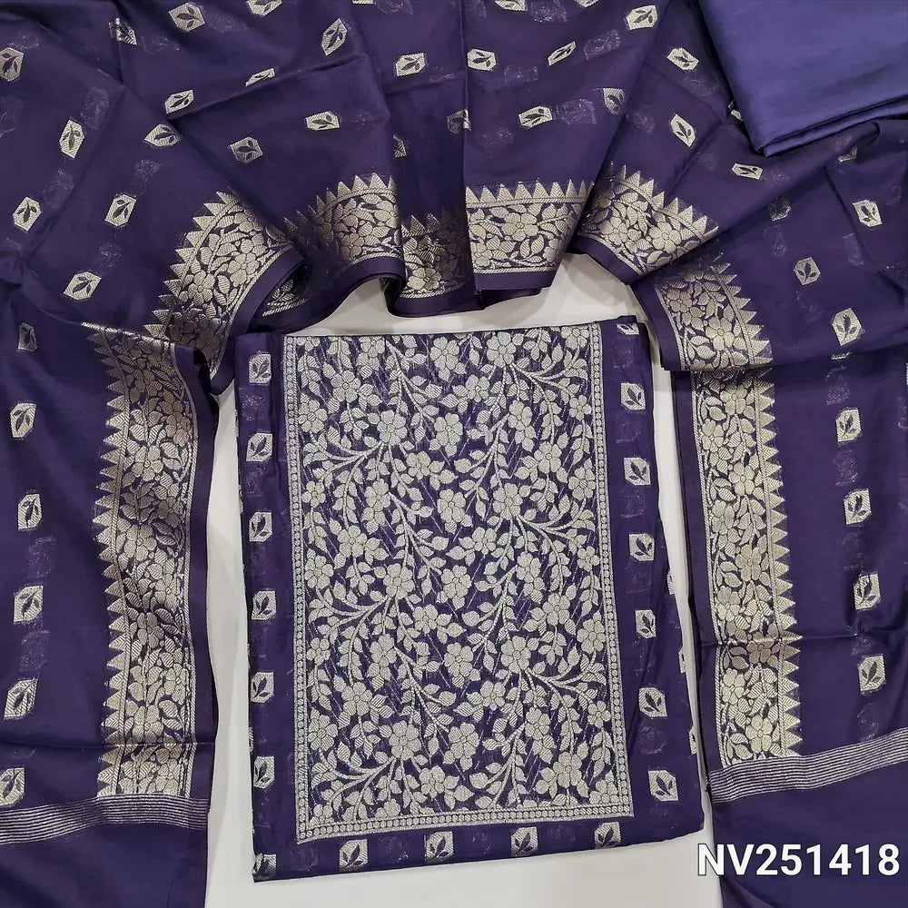 Dark purple fancy silk unstitched salwar material(silky, lining need)zari woven on yoke, zari weaving all over, matching silky bottom, benarasi weaving buttas on soft silk cotton dupatta with borders. NV251418