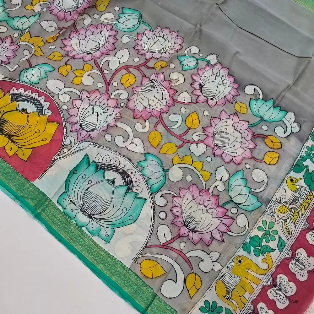 Black premium raw silk unstitched salwar material (textured, Lining Needed) thread woven buttas all over, silver grey silk cotton bottom, original pen kalamkari silk dupatta with zari borders. NV251604