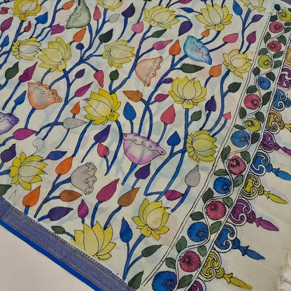 Bright turquoise blue premium raw silk unstitched salwar material (textured, Lining Needed) thread woven buttas all over, silver grey silk cotton bottom, original pen kalamkari silk dupatta with zari borders. NV251610