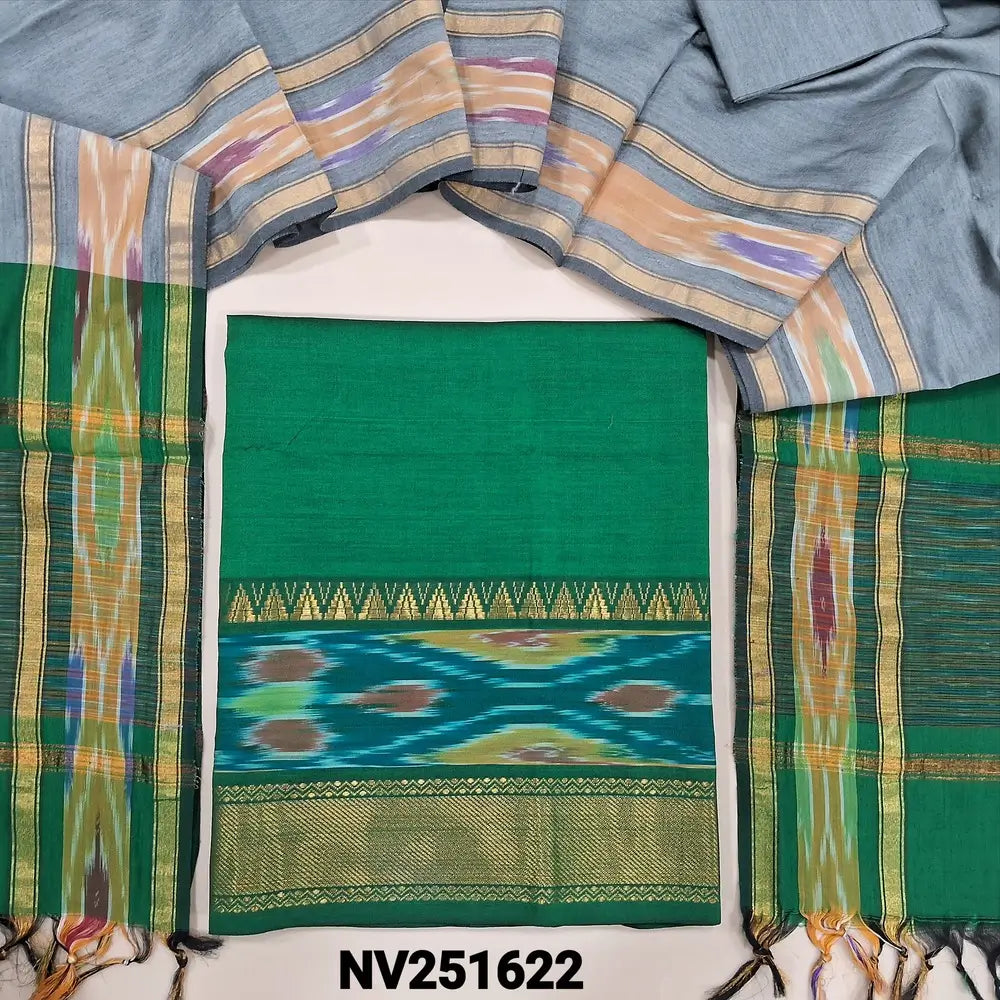 Emerald green silk cotton unstitched salwar material, thread woven design on daman(lining needed)silver grey silk cotton bottom, dual shaded silk cotton dupatta with ikat woven borders & tassels. NV251622