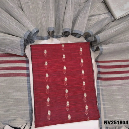 Dark Maroon Slub silk cotton unstitched salwar material, zari woven buttas all over (Weaving pattern might vary slightly, lining needed) beige silk cotton bottom, dupatta with striped pallu. NV251804