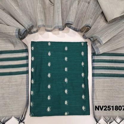 Dark Green slub silk cotton unstitched salwar material, zari woven buttas all over (Weaving pattern might vary slightly, lining needed) beige silk cotton bottom, dupatta with striped pallu. NV251807