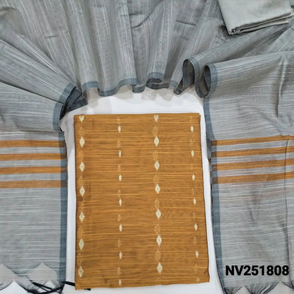 Golden Mehandi Yellow slub silk cotton unstitched salwar material, zari woven buttas all over (Weaving pattern might vary slightly, lining needed) beige silk cotton bottom, dupatta with striped pallu. NV251808