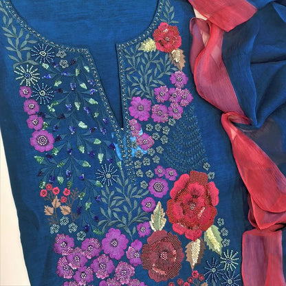 Royal blue premium silk cotton unstitched salwar material,embroidery and handmade bead work on yoke(thin,lining needed) santoon bottom,pure chiffon dupatta with contrast tapings. NV251912