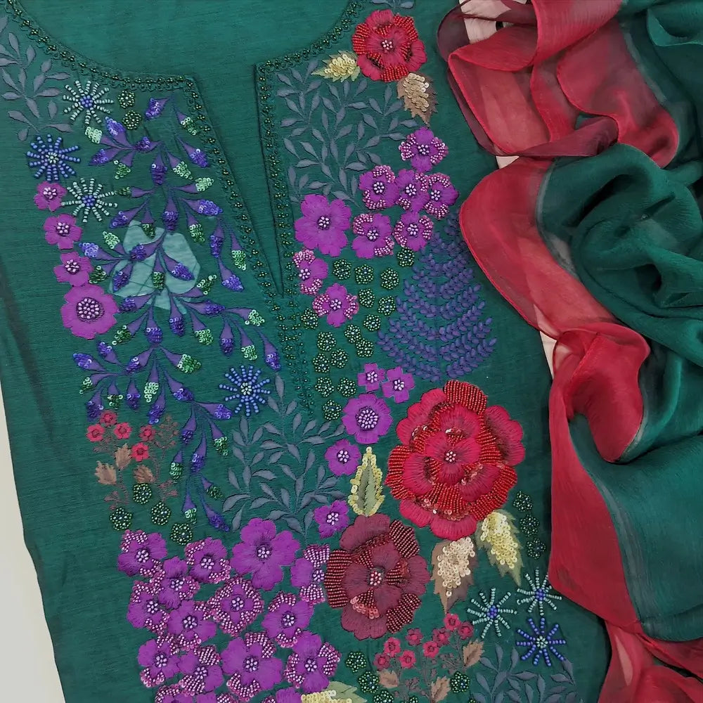 Bottle Green premium silk cotton unstitched salwar material,embroidery and handmade bead work on yoke(thin,lining needed) santoon bottom,pure chiffon dupatta with contrast tapings. NV251913