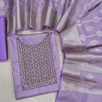 Lavender with golden tint tissue silk cotton unstitched salwar material, cut bead and sugar bead work on yoke ( Lining Needed) Matching silk cotton bottom, rich benarasi woven tissue silk cotton full length dupatta with borders and tassles. NV252223