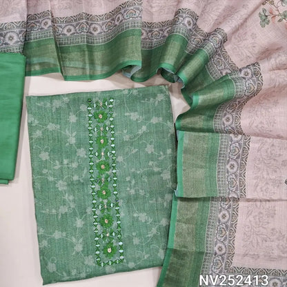 Green with gold tint printed fancy tissue silk cotton unstitched salwar material, real mirror and thread work on yoke (Lining Needed) Matching Silky Bottom, Tissue Silk Cotton printed Dupatta. NV252413