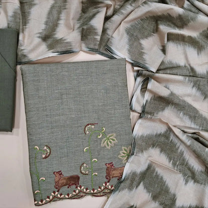 Greyish beige fancy silk cotton unstitched salwar material,pichwai embroidery work on yoke & daman, round notch neck  (Lining Needed) matching cotton bottom, ikat printed silk cotton dupatta. NV252605