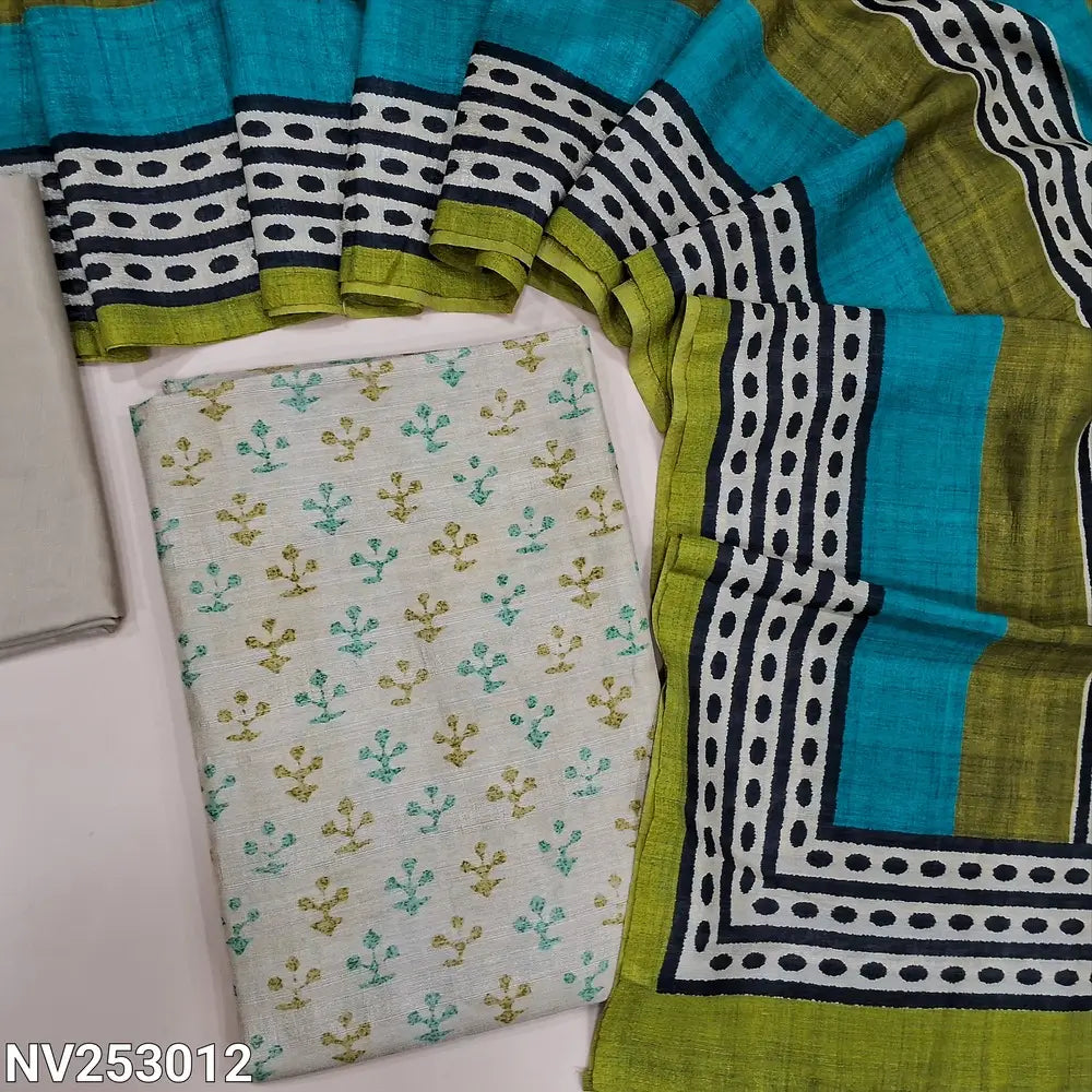 Printed rich Beige premium tussar silk unstitched salwar material (lining needed) matching silky botom,  printed blue & green tussar silk full length dupatta. NV253012