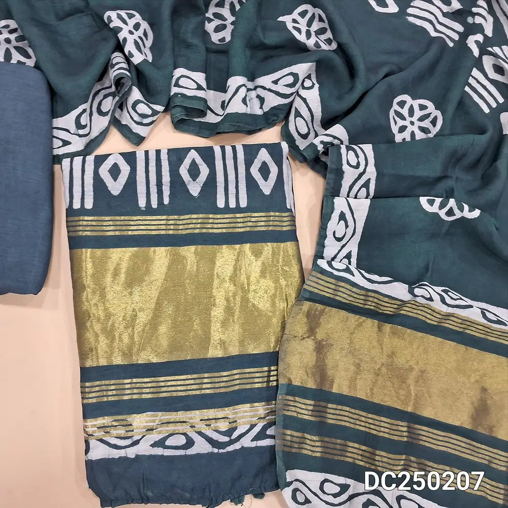 Original batik dyed dark grey fancy  silk cotton unstitched salwar material(lining needed) tissue borders on daman, matching silky bottom, batik dyed fancy silk cotton dupatta with tissue border on pallu, pompom tapings. DC250207