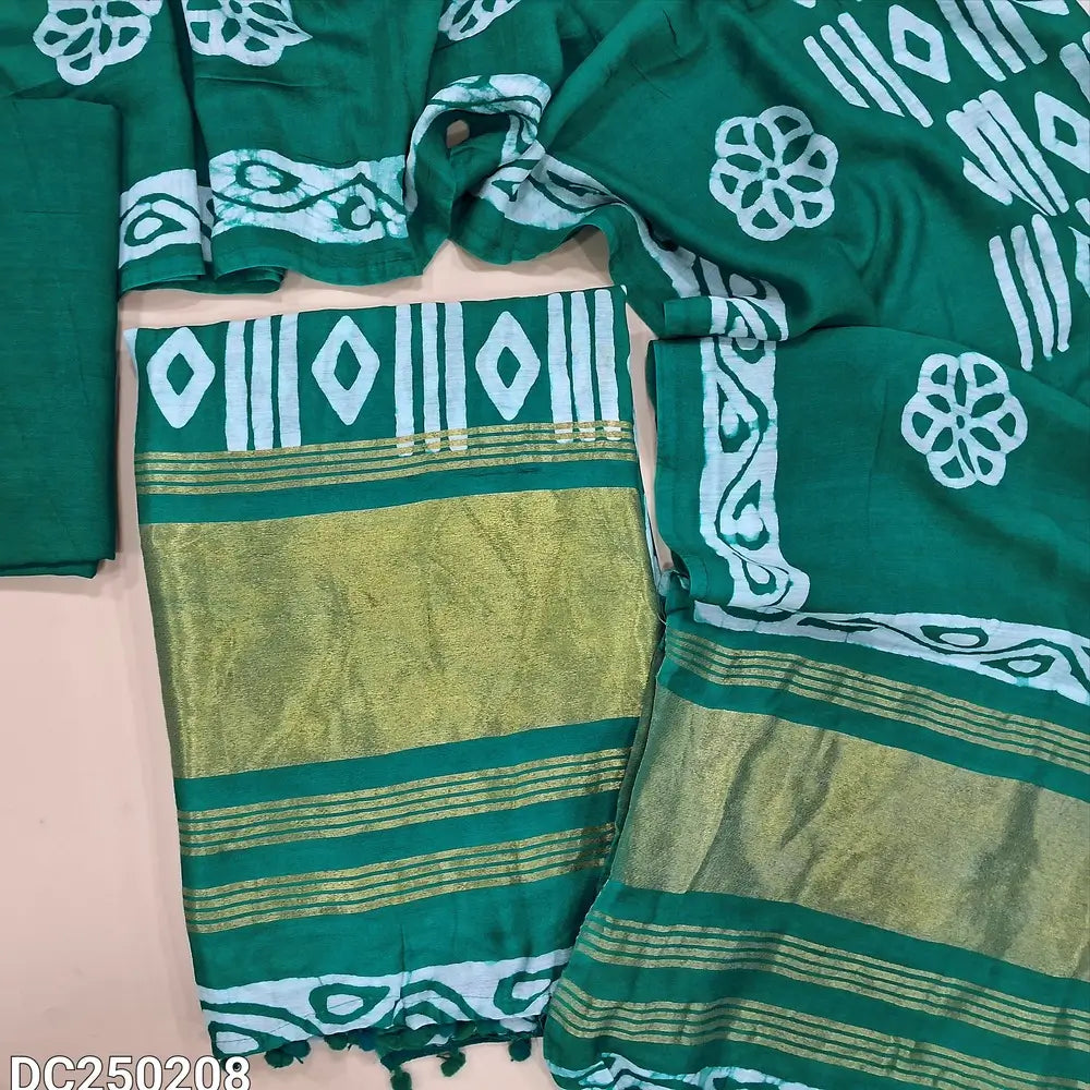 Original batik dyed turquoise Greene fancy  silk cotton unstitched salwar material(lining needed) tissue borders on daman, matching silky bottom, batik dyed fancy silk cotton dupatta with tissue border on pallu, pompom tapings. DC250208