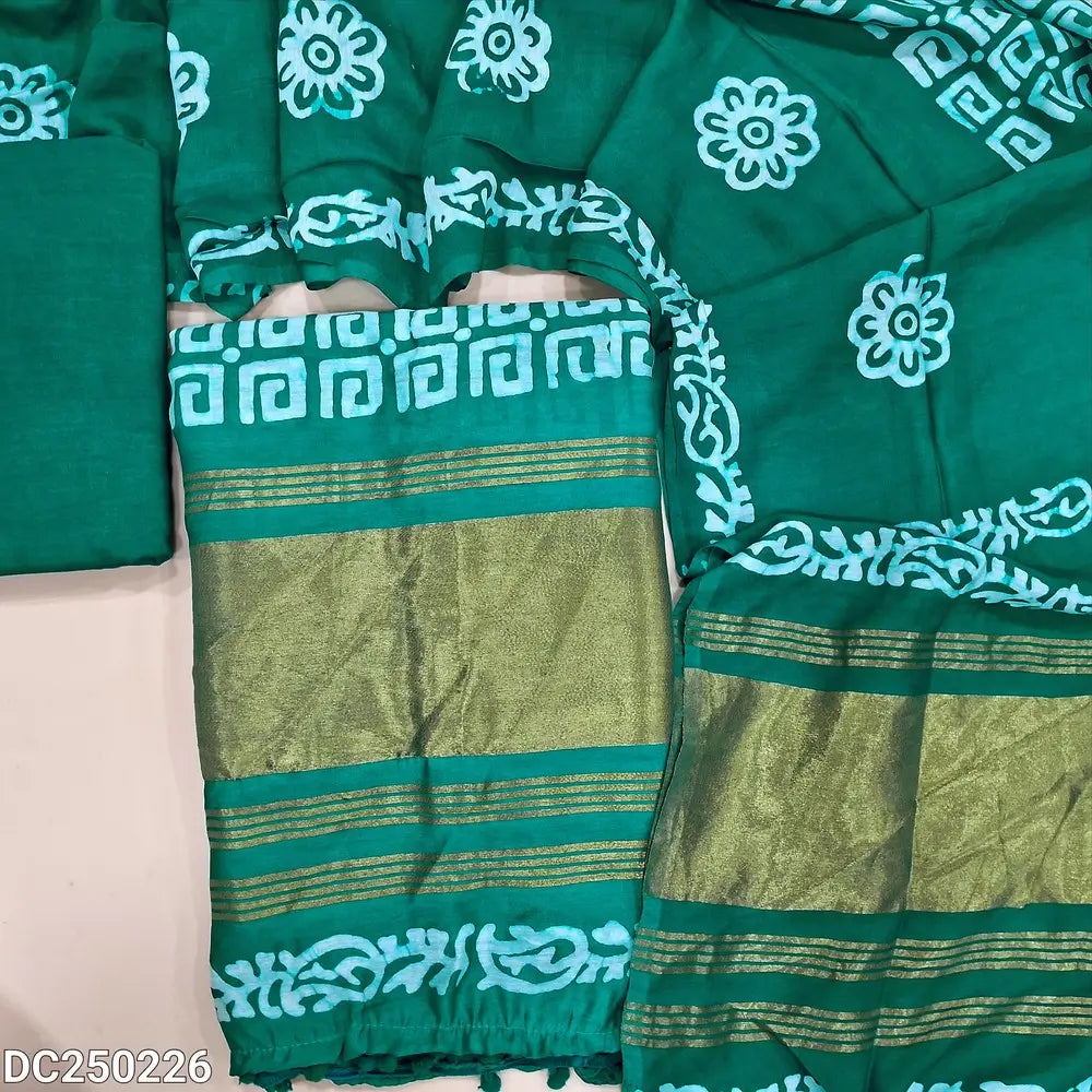 Original batik dyed turquoise Greene fancy  silk cotton unstitched salwar material(lining needed) tissue borders on daman, matching silky bottom, batik dyed fancy silk cotton dupatta with tissue border on pallu, pompom tapings. DC250229