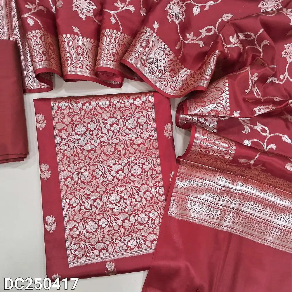 Red silk cotton unstitched salwar material(lining needed) heavy benaras woven on yoke, zari woven buttas allover, matching silk cotton bottom, rich benaras weaving silk cotton dupatta with tassels. DC250417