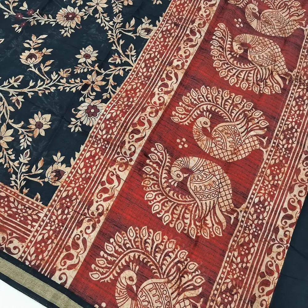 Floral printed Black premium silk cotton unstitched salwar material(lining needed) printed reddish maroon daman, matching spun cotton bottom, floral printed premium silk cotton full length dupatta with printed reddish maroon pallu. DC250419