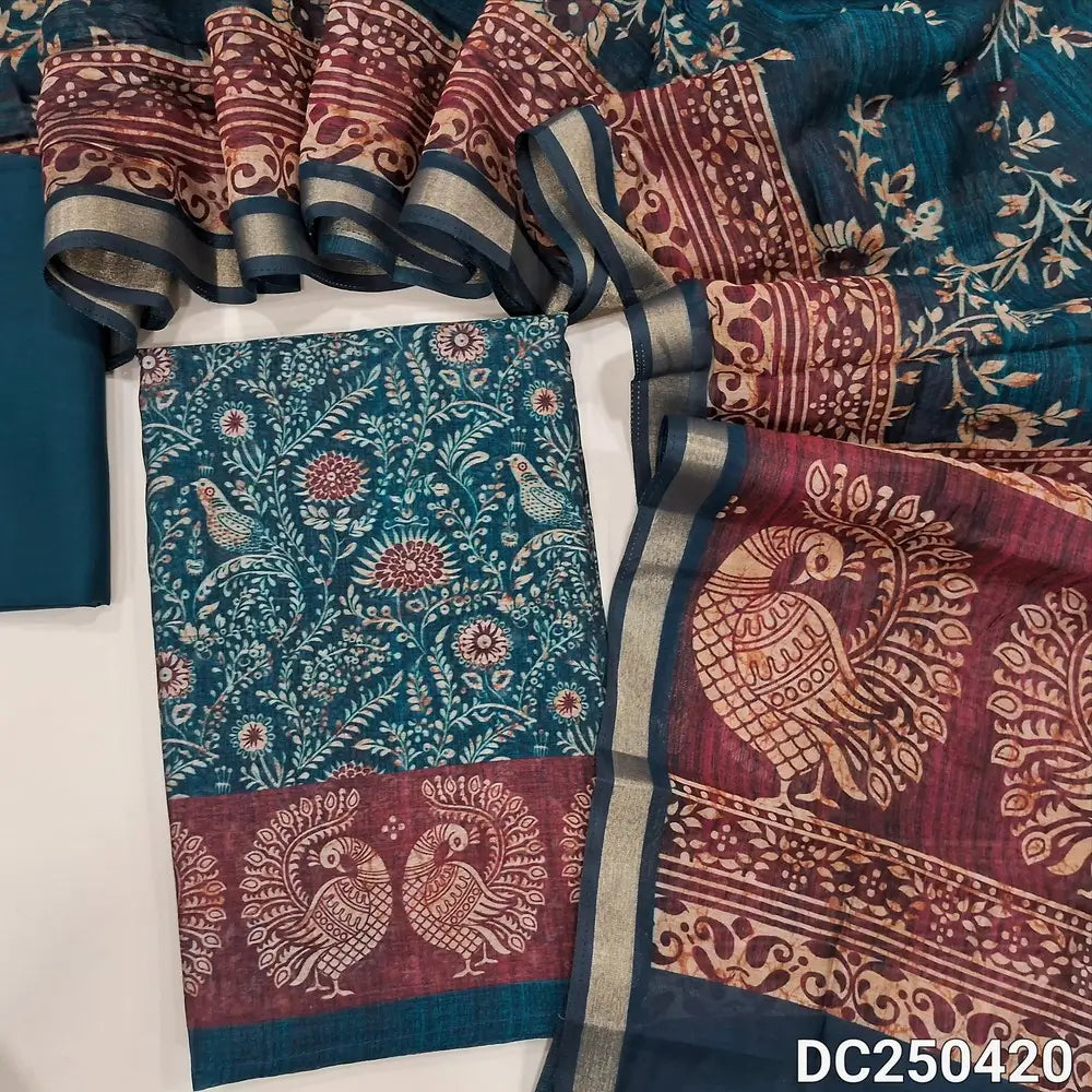 Floral printed teal Green premium silk cotton unstitched salwar material(lining needed) printed reddish maroon daman, matching spun cotton bottom, floral printed premium silk cotton full length dupatta with printed reddish maroon pallu. DC250420