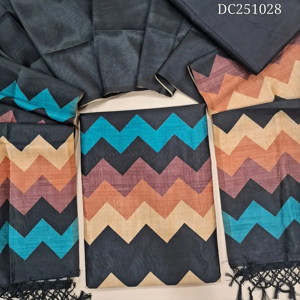 Black fancy semi tussar unstitched salwar material (lining needed) beige zigzag printed daman, or yoke, matching silky bottom, zigzag printed fancy semi tussar full length dupatta with tassels. DC251028
