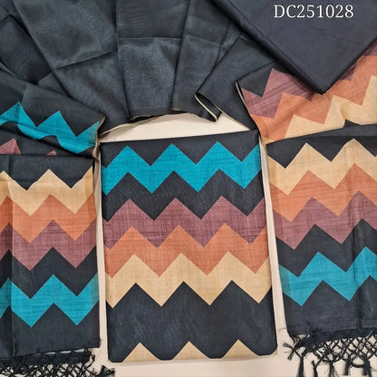 Black fancy semi tussar unstitched salwar material (lining needed) beige zigzag printed daman, or yoke, matching silky bottom, zigzag printed fancy semi tussar full length dupatta with tassels. DC251028