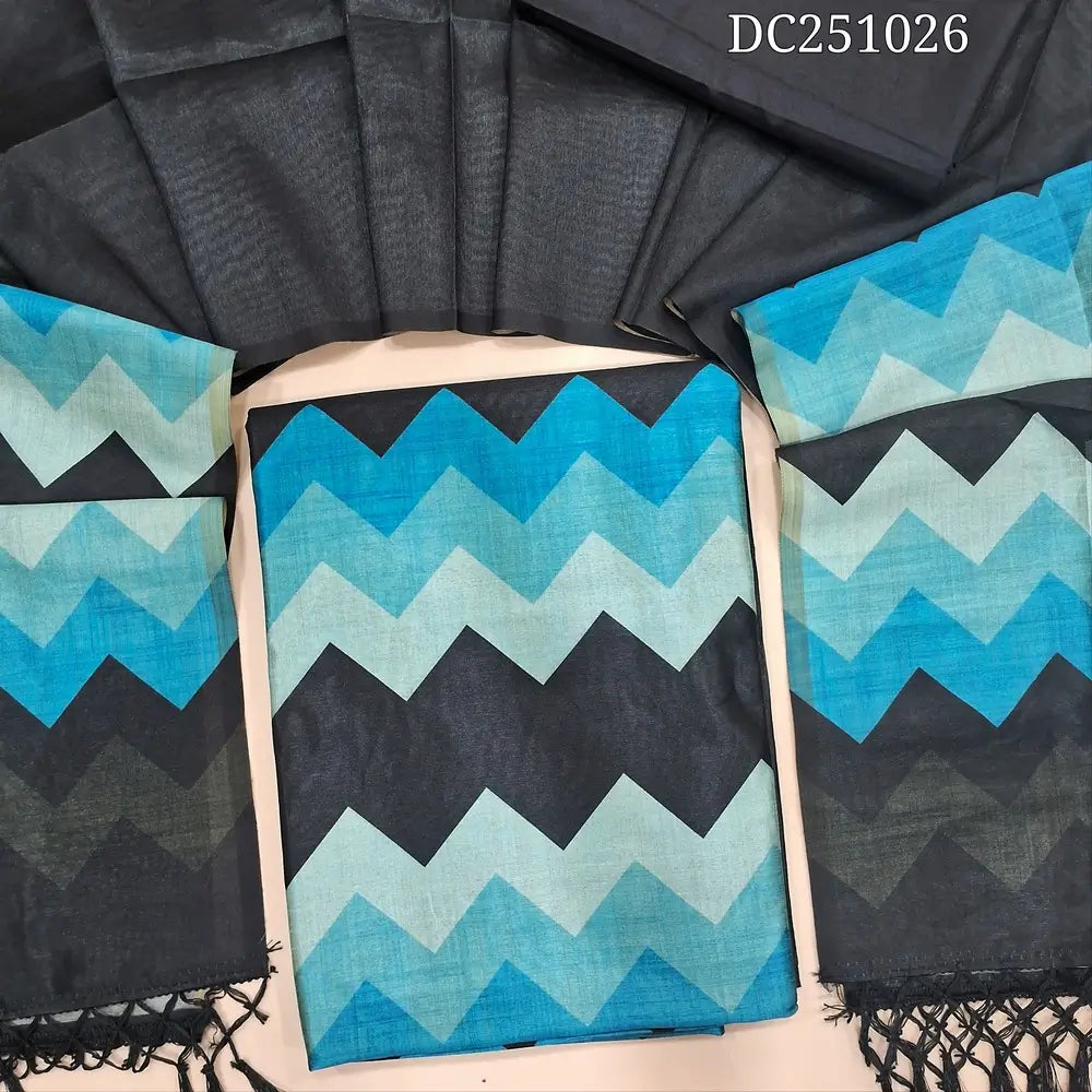 Black fancy semi tussar unstitched salwar material (lining needed) blue zigzag printed daman, or yoke, matching silky bottom, zigzag printed fancy semi tussar full length dupatta with tassels. DC251026