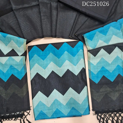 Black fancy semi tussar unstitched salwar material (lining needed) blue zigzag printed daman, or yoke, matching silky bottom, zigzag printed fancy semi tussar full length dupatta with tassels. DC251026