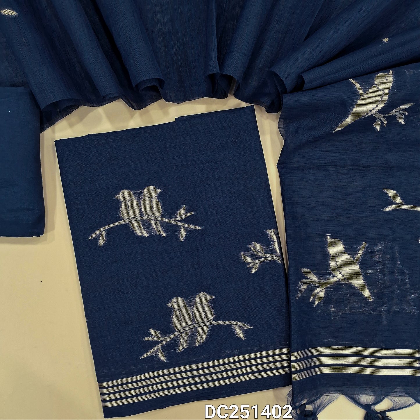 Designer dark Blue jamdani woven premium tussar silk unstitched salwar material, (textured, lining needed) golden zari weaving on daman, santoon bottom, full length jamdani woven tussar silk dupatta with tassels. DC251402