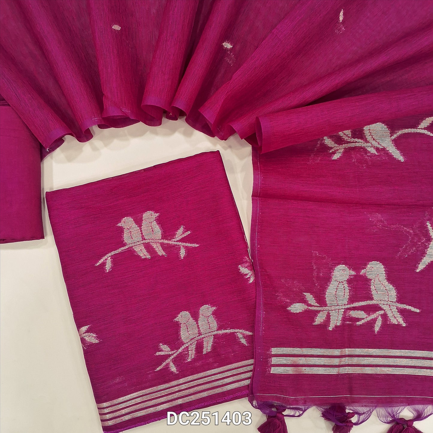 Designer bright Pink jamdani woven premium tussar silk unstitched salwar material, (textured, lining needed) golden zari weaving on daman, santoon bottom, full length jamdani woven tussar silk dupatta with tassels. DC251403