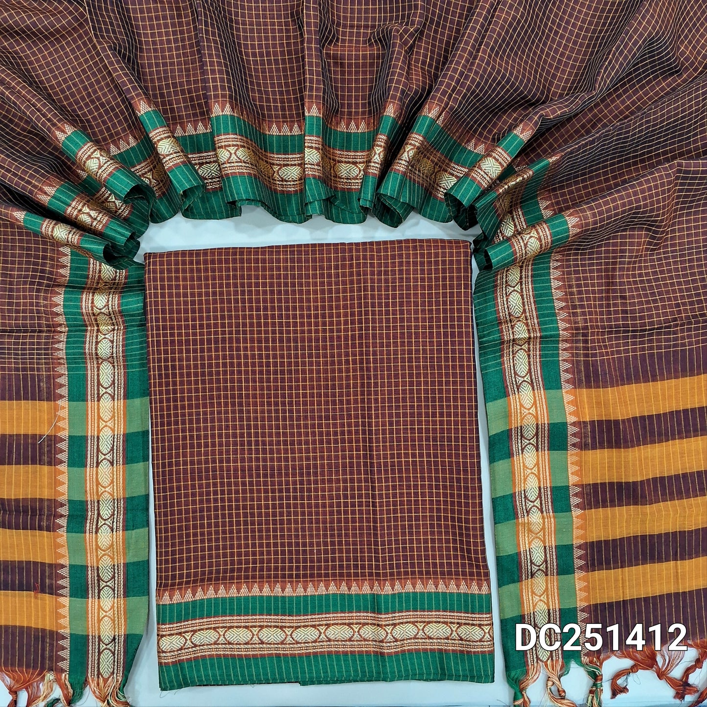Maroon mercerised handloom cotton unstitched salwar material, checked all over, double side borders (Thin, Lining Needed) Fabric Measurement : 4.5 Metres, Full length dupatta. Note : Weaving Inconsistencies are not defects. DC251412