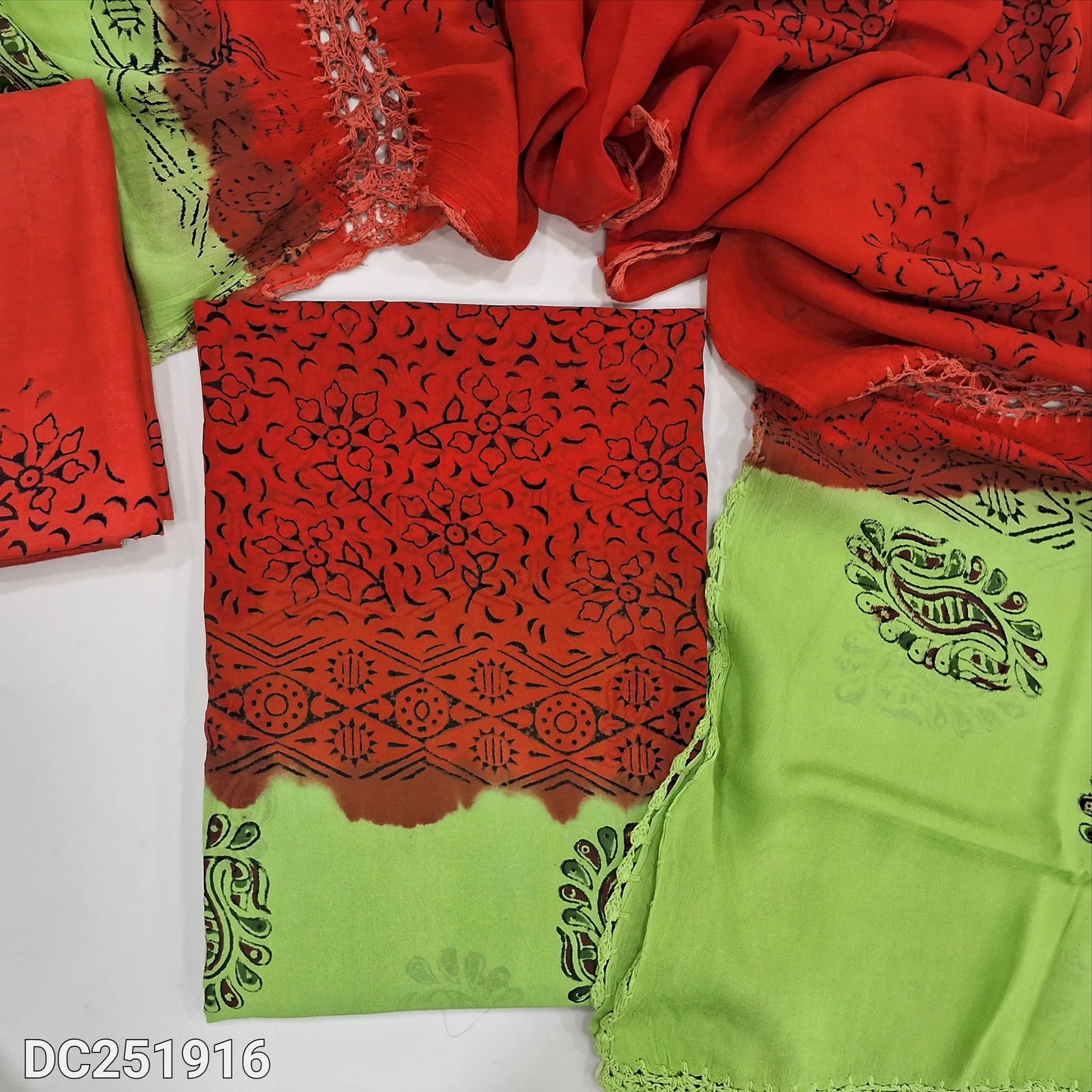 Green & Orange crepe georgette unstitched salwar material (lining needed) hand block printed allover, santoon bottom, crochet work on dual shade chiffon dupatta (TAPING NEEDED). DC251916 (over lapping of prints not consider as a defect