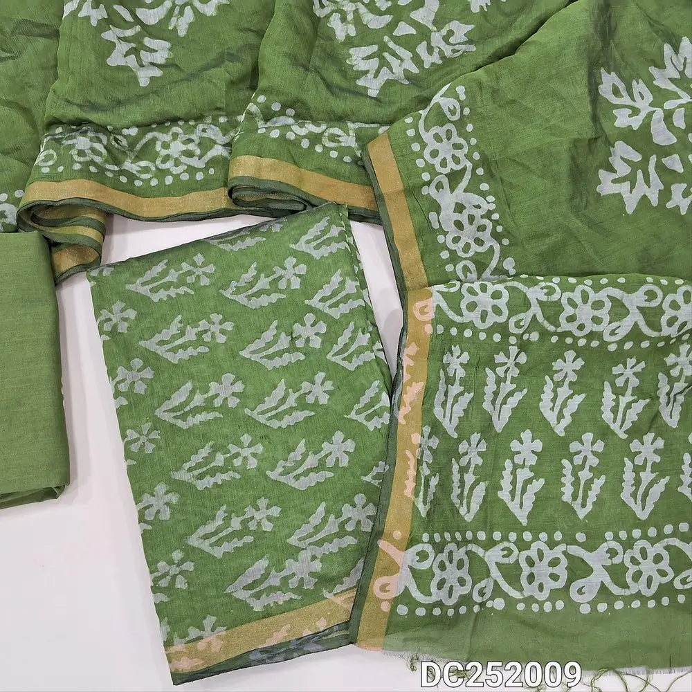 Mossy Green soft silk cotton unstitched salwar material (lining needed) batik dyed allover, tissue border on daman, matching wax batik cotton bottom, batik dyed full length silk cotton dupatta.(TAPING NEEDED). DC252009