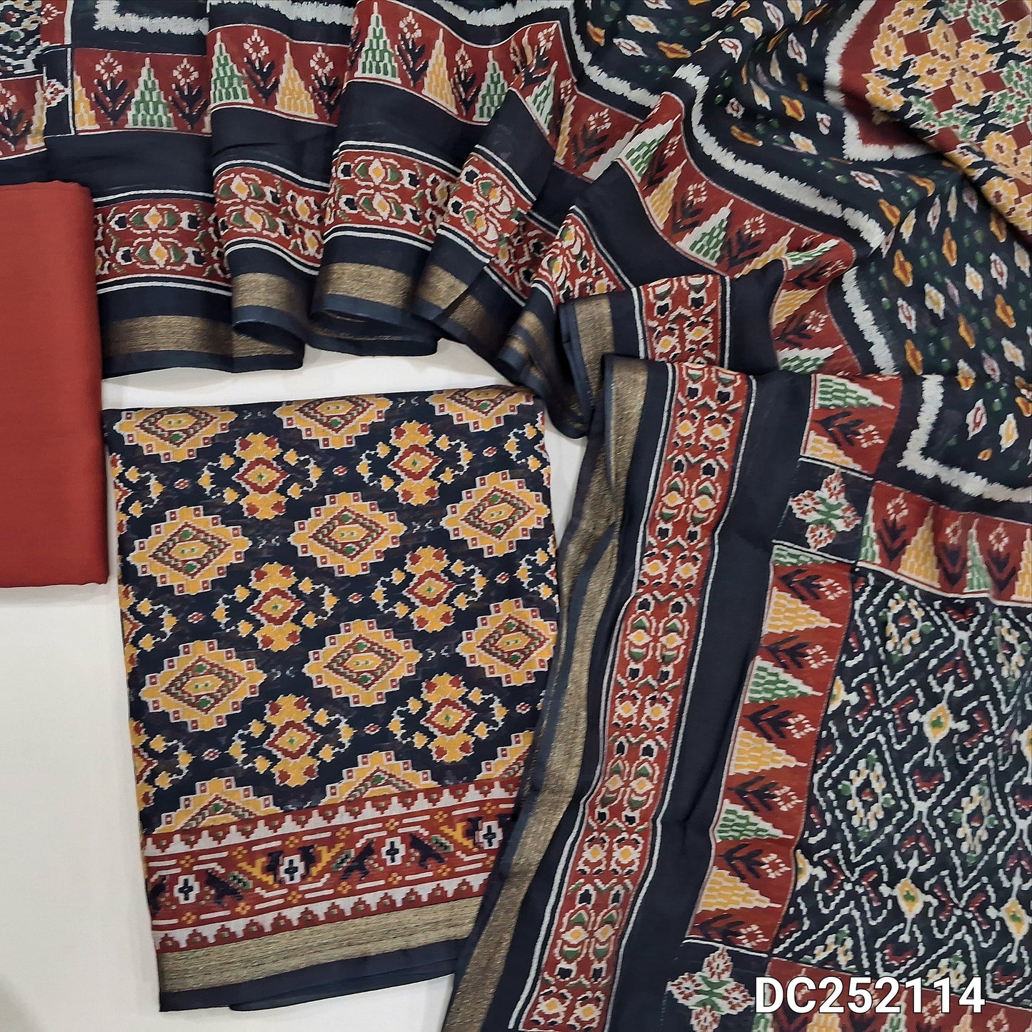 Patola Printed Black premium silk cotton unstitched salwar material (lining needed) tissue border on daman, maroon spun cotton bottom, patola printed premium silk cotton full length dupatta. DC252114