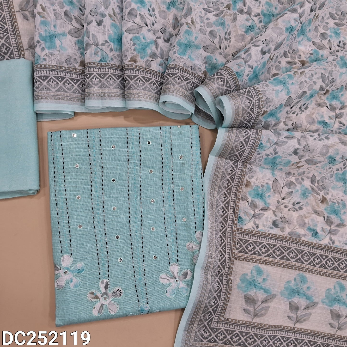 Pastel Blue semi linen unstitched salwar material (lining optional) kantha stitch, applique work on yoke, matching santoon bottom, digital floral printed semi linen dupatta. DC252119