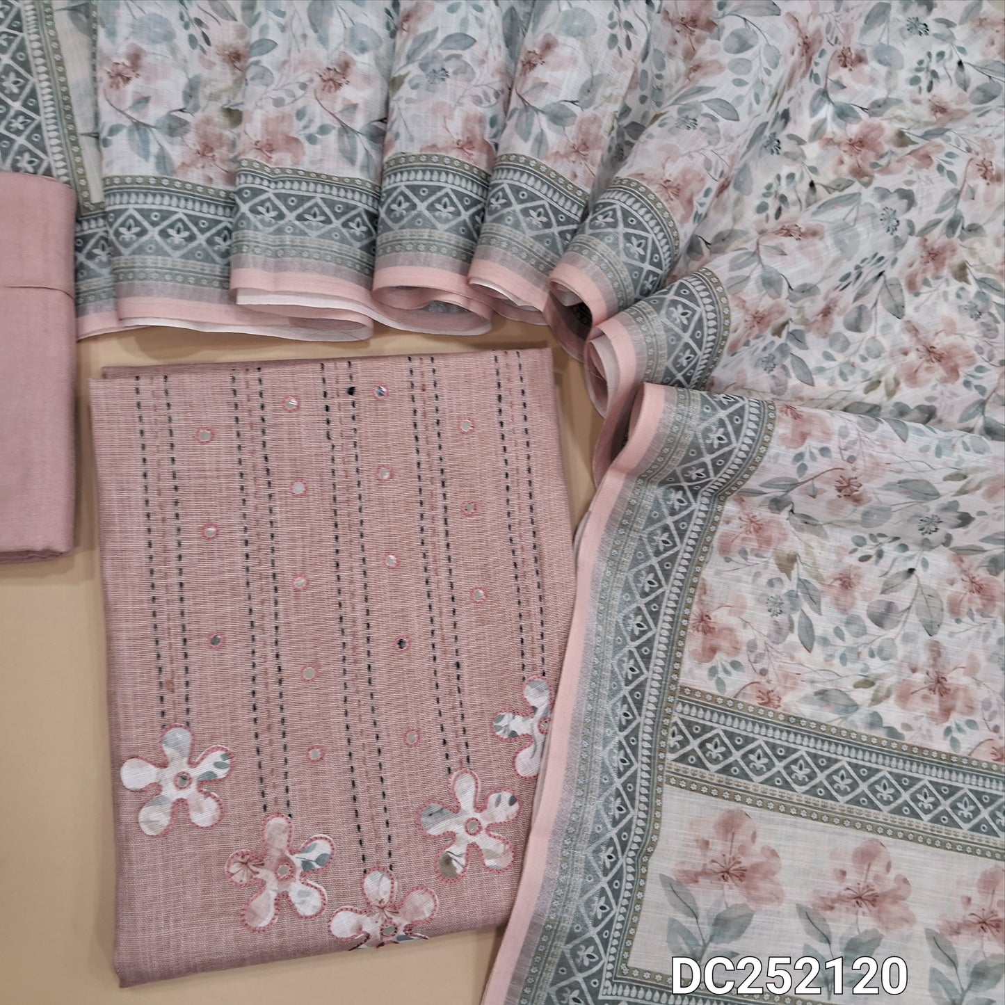 Light onion Pink semi linen unstitched salwar material (lining optional) kantha stitch, applique work on yoke, matching santoon bottom, digital floral printed semi linen dupatta. DC252120