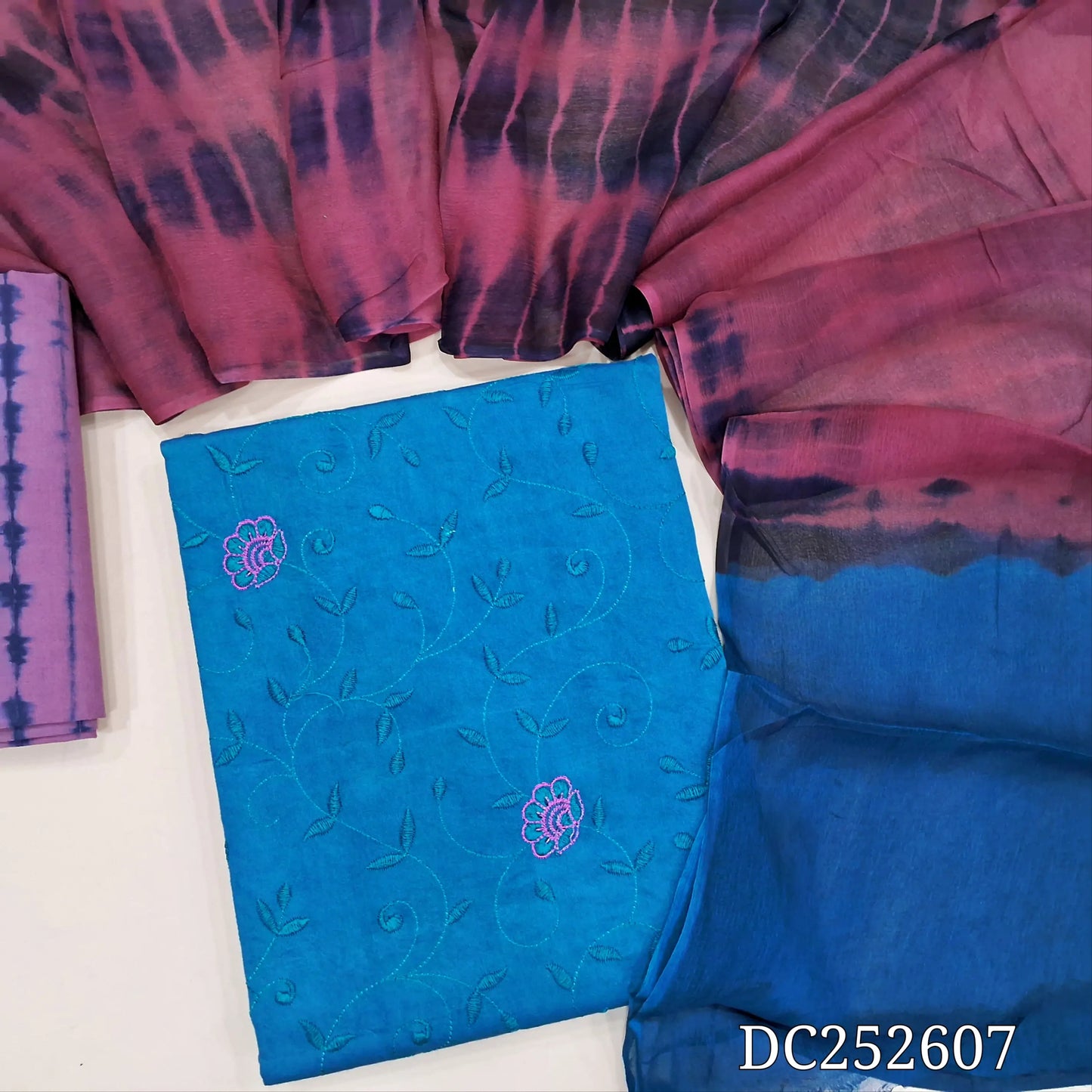 Blue pure cotton unstitched salwar material (lining needed) heavy embroidery work on front, shibori dyed pink cotton bottom,  shibori dyed premium chiffon dupatta. DC252607