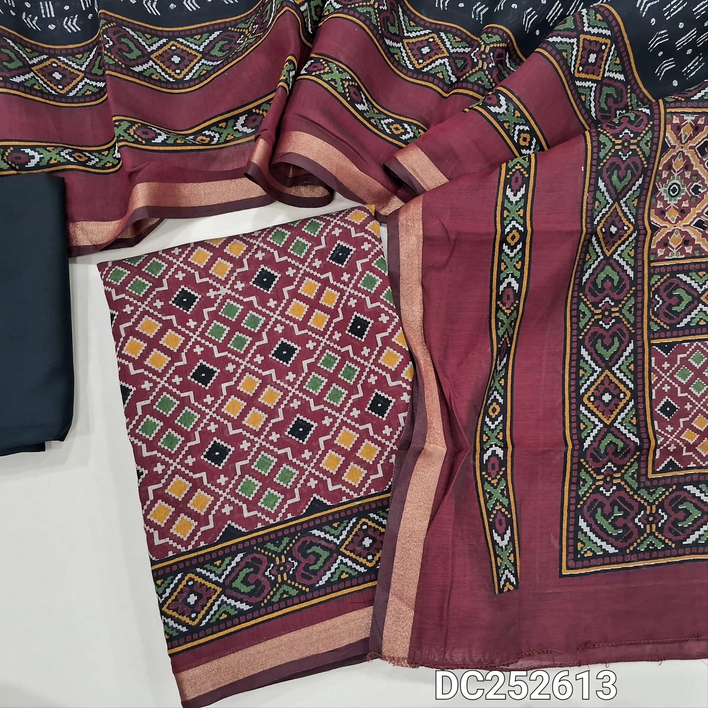 Premium dark Maroon premium silk cotton unstitched salwar material (lining needed) patola printed allover, black spun cotton bottom, patola printed premium silk cotton dupatta. DC252613
