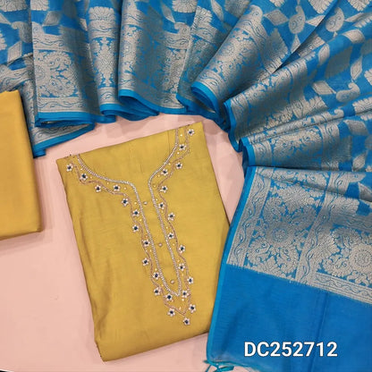 Mehandhi Yellow soft silk cotton unstitched salwar material(lining needed) bead, zardozi work on yoke, matching soft silk cotton bottom,  heavy benarasi weaving blue silk cotton dupatta with tassels. DC252712