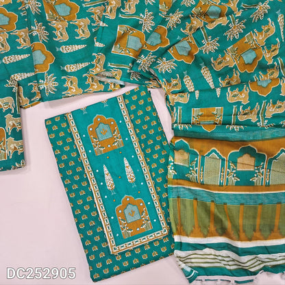 Printed teal Green pure cotton unstitched salwar material (lining optional) thread work on yoke, printed cotton bottom, printed mul cotton dupatta with pompom tapings.DC252905