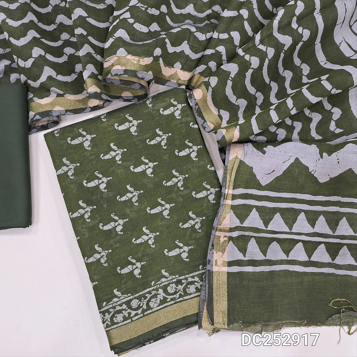 Digital printed batik design dark olive green soft silk cotton unstitched salwar material (lining needed)tissue borders on daman, matching spun cotton bottom,  batik design soft silk cotton full length dupatta. DC252917