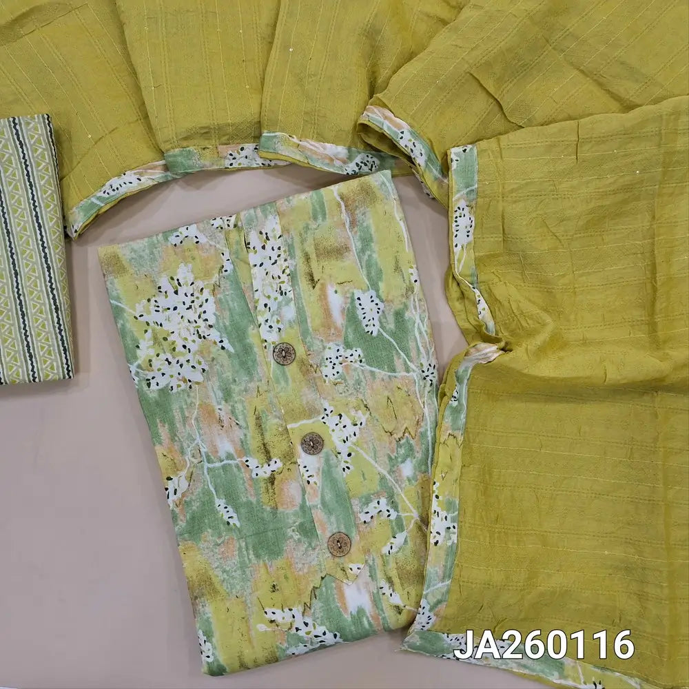 Abstract printed light Green & yellow slub cotton unstitched salwar material (lining optional) wooden buttons on yoke, printed slub cotton bottom, thread & sequence work on jakard silk cotton dupatta with tapings. JA260116