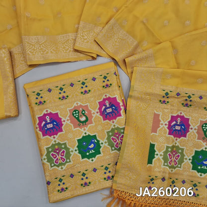 Designer lemon Yellow premium silk unstitched salwar material (lining needed) meenakari weaving patola design on daman, matching silk bottom with zari borders, premium silk cotton full length dupatta with meenakari weaving design pallu. JA260206