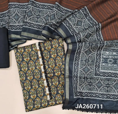 Printed Black semi tussar unstitched salwar material (lining needed) brown floral print allover, matching cotton bottom, printed dual shad semi tussar dupatta with lace tapings. JA260711